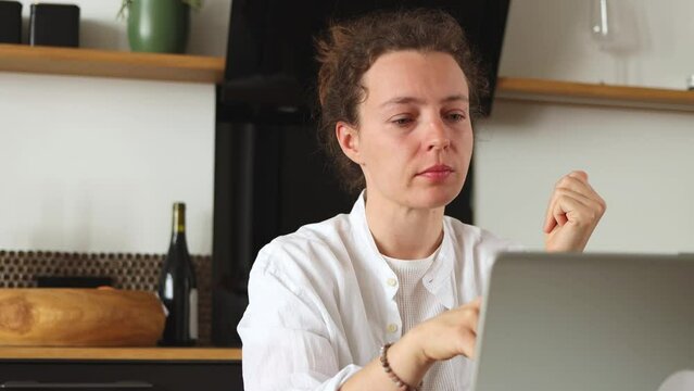 Tired young caucasian business woman professional student take off eyeglasses massaging dry itchy irritated eyes,feeling vision strain after home office computer work.Headache, visual fatigue concept