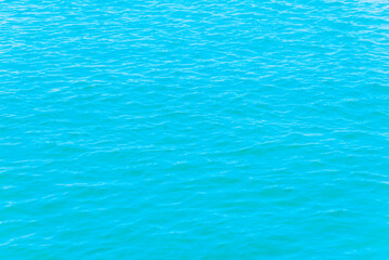 Beautiful turquoise blue sea calm wave summer shot.Banner,copy space.Toned.