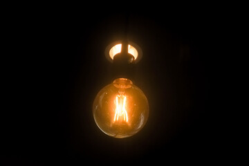 orange light bulbs in a restaurant