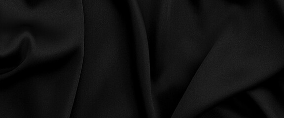 Obraz premium Black silk fabric texture background