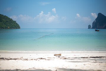 white beach and blue water