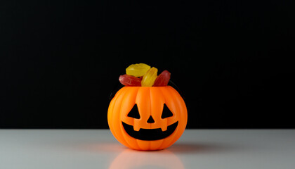 Halloween pumpkin with candies