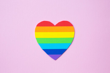 Love Valentines heart in rainbow pride colours on the pink background