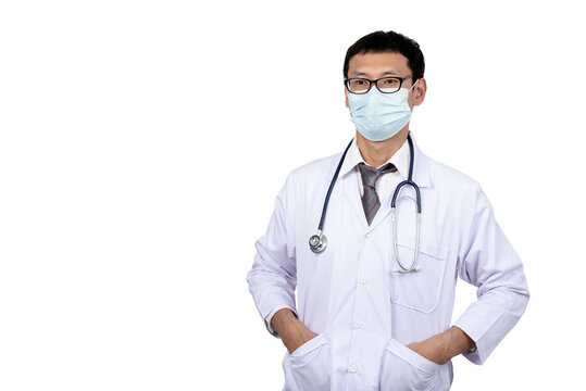portrait images of Asian man doctor wearing a surgical mask, with white isolated background, to Asian doctor and health care concept.
