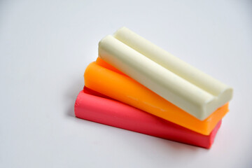 Plasticine blocks orange red and white