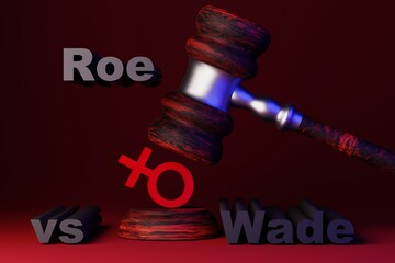 The concept of violation of women's rights. The judge's gavel hits the women's sign. Roe vs Wade....