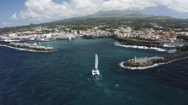 Aerial View of Sailboat while sailing in a regatta off the coast of Matriz, Azores, Portugal.
