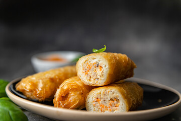 Nem meat and vegetables nems spicy sauce cuisine deep fried spring rolls fresh healthy meal food snack diet on the table copy space food background rustic top view