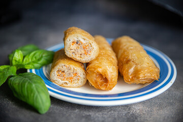 Nem meat and vegetables nems spicy sauce cuisine deep fried spring rolls fresh healthy meal food snack diet on the table copy space food background rustic top view
