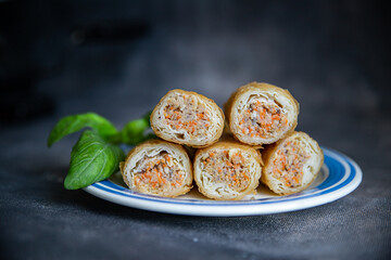 Nem meat and vegetables nems spicy sauce cuisine deep fried spring rolls fresh healthy meal food snack diet on the table copy space food background rustic top view