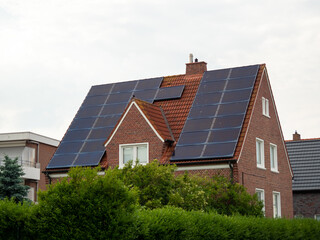Solar panels on the roof of the house.