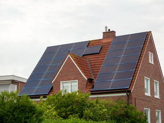 Solar panels on the roof of the house.