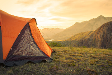 hiking tent in the mountains in summer  - obrazy, fototapety, plakaty