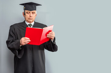 Academician, Professor, Prof is wearing a cap with Tassel and black gown. Senior educator or Doctor of Philosophy, learned man from a university or college