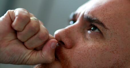 Frustrated man thinking, redhair guy pensive looking for solution to problem