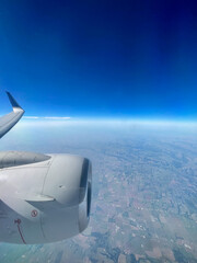 Fototapeta na wymiar View of the engine and winglet over the midwestern United States