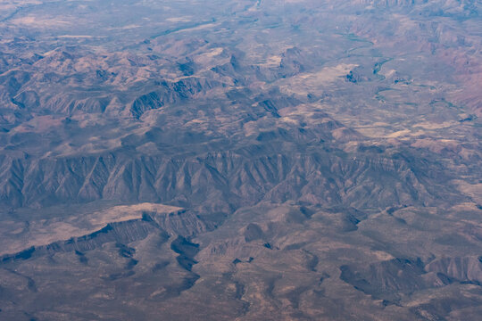 Aerial view of Canyons, Mesas, and dry riverbeds in the South Western United States.