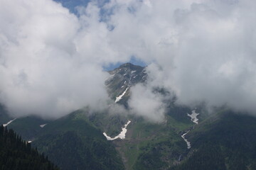The top of the mountain in the clouds near Lake Ritsa in Abkhazia.