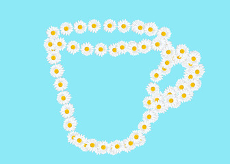 Tea cup outline made from camomiles on blue