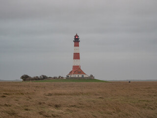 Fototapeta na wymiar The Westerheversand Lighthouse in Germany