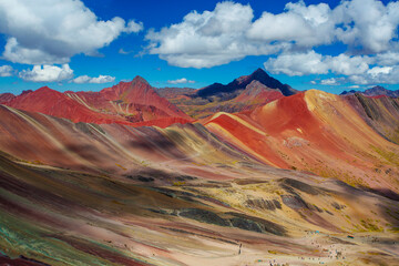 Hiking scene in Vinicunca, Cusco Region, Peru. Rainbow Mountain (Montana de Siete Colores).