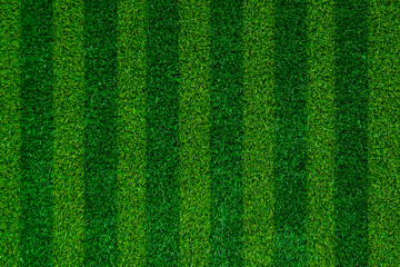 Abstract green grass football field of artificial grass background texture,Top view