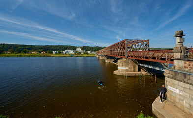 Fototapeta na wymiar Old bridge over Vltava river in Veltrusy, Czech Republic