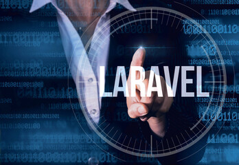 Business Woman with finger pressing  Laravel  button on virtual screens. Modern technology concept
