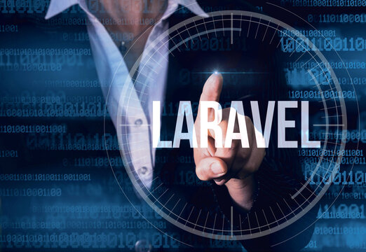 Business Woman with finger pressing  Laravel  button on virtual screens. Modern technology concept
