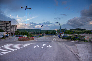 Fototapeta na wymiar roundabout and rain clouds in Bistrita, Romania, June 2022