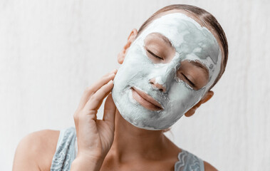 Pretty Woman with Clay Face Mask