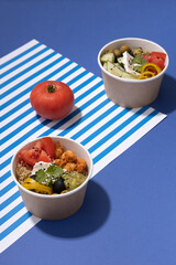fast food vegetable soup on a blue background