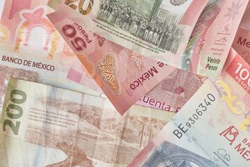 Obraz premium Mexican coins and banknotes. Mexican peso, Latin American currency. money, saved, finances, 