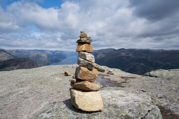 Cairn above the lysebotn fjord near preikestolen