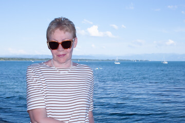 Portrait of a mature woman in front of Lake Constance in Germany