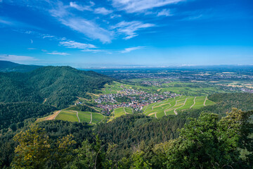 Fototapeta na wymiar View over the Black Forest to the vineyards of the village Neuweier near Baden Baden, Germany