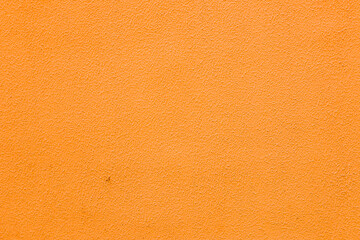  Abstract background of orange plaster.