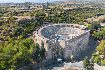 Obraz premium Amphitheater of Aspendos. Turkey. Ruins of an ancient city with an amphitheater. Shooting from a drone