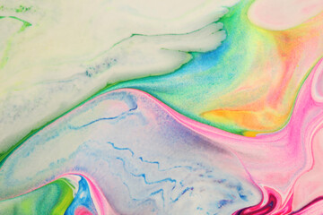 Pouring flow acrylic, ink and watercolor marble painting. Color wave texture blots Abstract background.