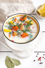Lohikeitto, Finnish creamy salmon soup in a white bowl