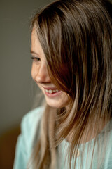 portrait of a cute girl with long blonde hair 6-7 years old