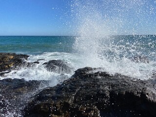 waves crashing on rocks