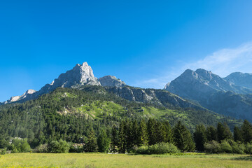 Obraz premium Albanian Alps view. Accursed Mountains landscape viewed from Valbona and Theth hiking trail in Albania, popular hiking trail in the Albanian Alps.