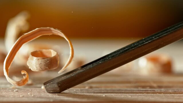 Super slow motion of detail of carving wood with a chisel. Low depth of focus, super macro shot. Filmed on high speed cinema camera, 1000 fps.