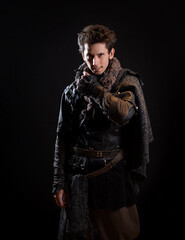 Fototapeta premium A guy in a steampunk or post-apocalyptic image, portrait on a black background