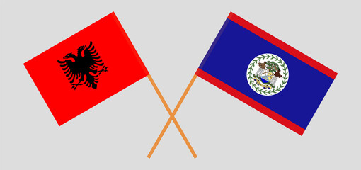 Crossed flags of Albania and Belize. Official colors. Correct proportion