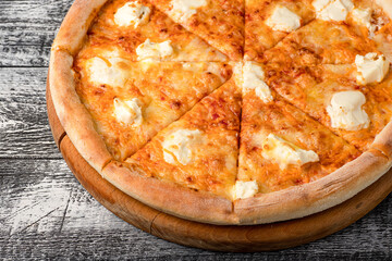 Pizza, hot pizza on a white wooden background, side and top view