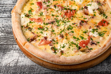 Pizza, hot pizza on a white wooden background, side and top view