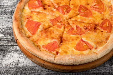 Pizza, hot pizza on a white wooden background, side and top view