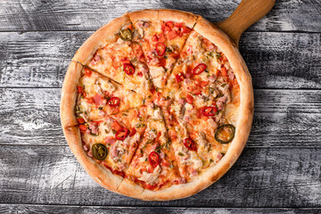 Pizza, hot pizza on a white wooden background, side and top view